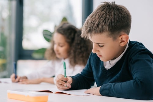 child completing school work